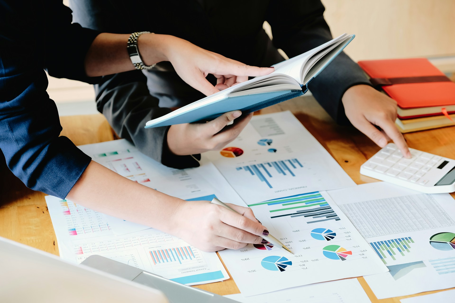 Researchers reviewing charts and data while studying situationship statistics and relationship research